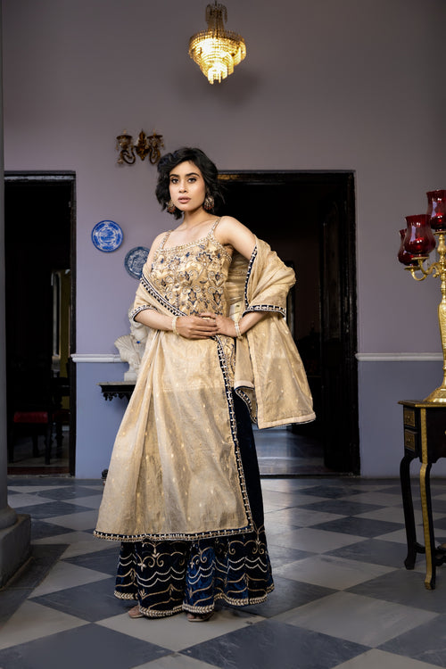 Elegant gold kurta with navy sharara and embroidered dupatta